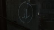 'JL' graffiti on the wall (Image via Apple TV+)